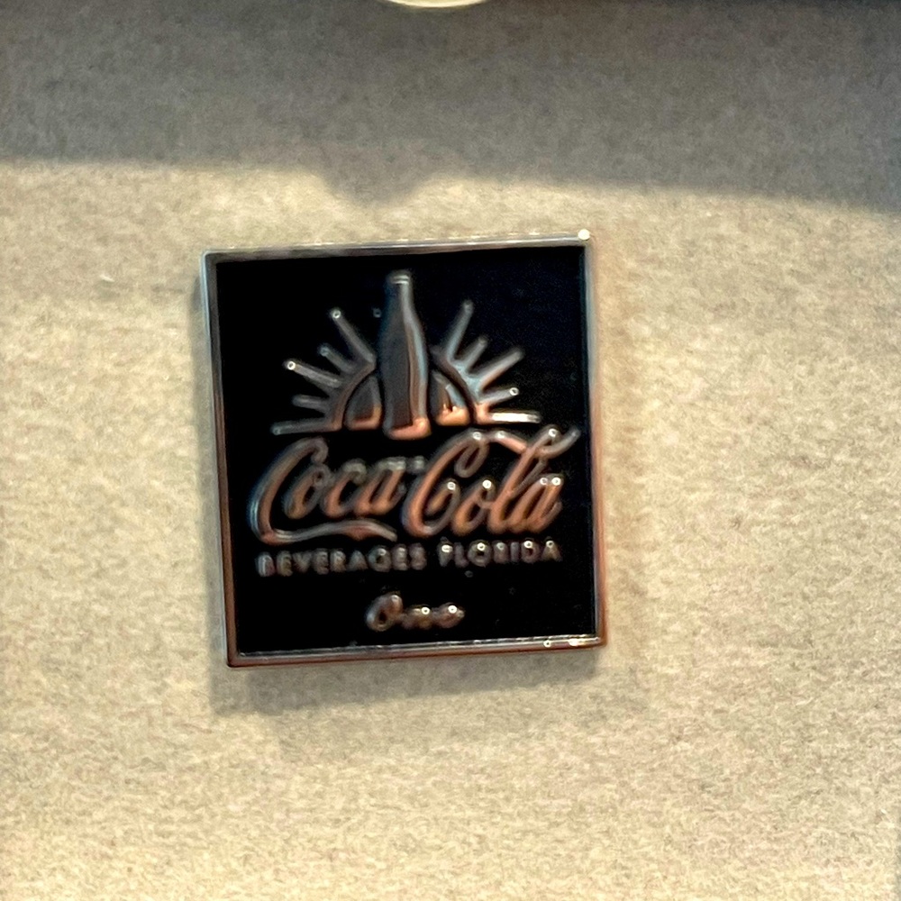 Coca-Cola one year service silver pin